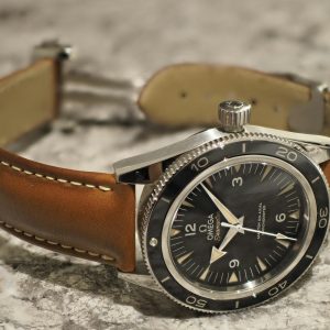 High-quality close-up of a luxury wristwatch with a brown leather strap, showcasing intricate details.