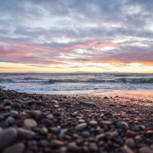beach, sunset, pebbles, stones, ocean, sea, sky, nature, seascape, coast, light, scene, sunlight, horizon, clouds, rocks, shore, waves, beach, pebbles, scene, scene, scene, scene, scene, clouds