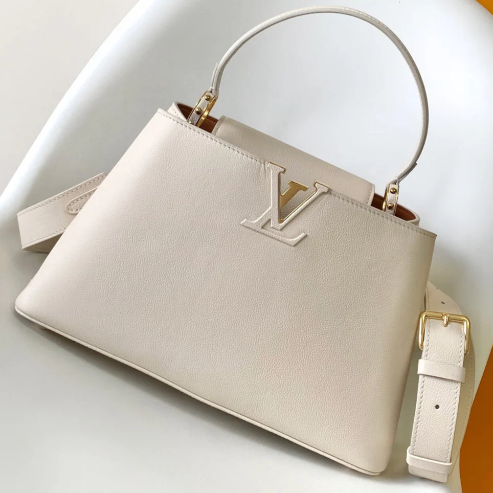 CAPUCINES GM 33CM BEIGE GOLD TAURILLON LEATHER 252023