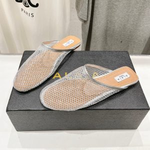 ALAIA FLAT MULES IN SILVER MESH FISHNET