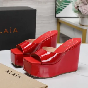 ALAIA PLATFORM WEDGE IN CHERRY RED LAMBSKIN WITH HEART EMBROIDERED