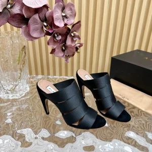 ALAIA ELASTIC CAGE MULE SANDALS IN BLACK WOVEN STRAP AND LAMBSKIN