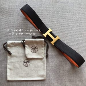 HM BELT BUCKLE & REVERSIBLE BLACK AND ORANGE LEATHER STRAP 38MM GOLD HARDWARE