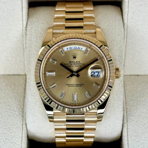 2023 Rolex Day-Date 40mm 228238 Champagne Diamond Baguette Dial
