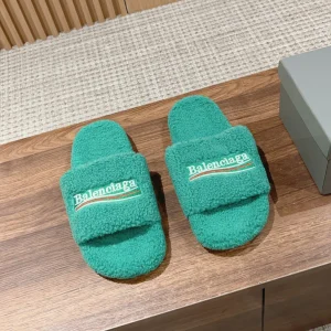 FURRY SLIDES IN TURQUOISE CURLY SHEARLING