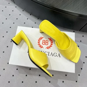 SQUARE-TOE MEDIUM HEEL MULES IN YELLOW CALFSKIN LOGO EMBOSSED