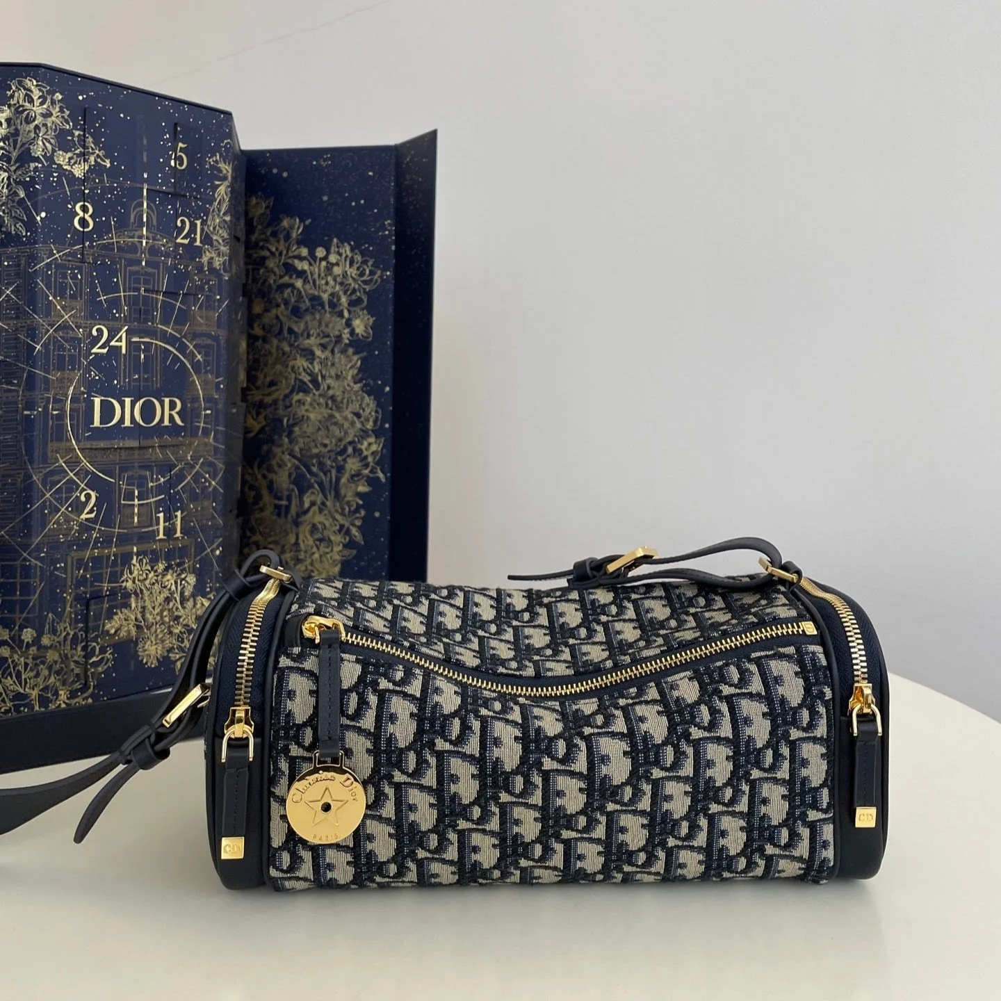 CD East-West cylindrical bag 27 blue jacquard canvas