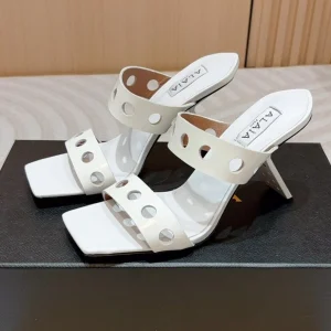 ALAIA TWO-STRAPS HIGH HEEL SANDALS IN WHITE PATENT LAMBSKIN