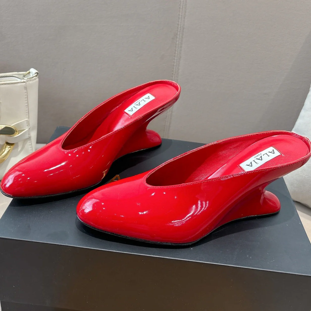 Alaia 25 Curve Wedge Mules Red Lambskin 293556