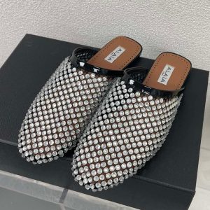 ALAIA FLAT MULES IN STRASS BLACK LAMBSKIN WITH RHINSTONES