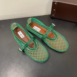 ALAIA BALLET FLATS IN COOL GREEN MESH FISHNET