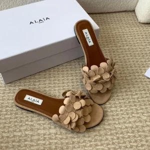 ALAIA FLAT MULE IN BEIGE CREAM SUEDE